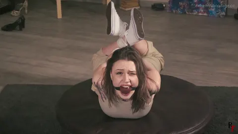 Ball Gagged and Hogtied in Converse Sneakers on a Turntable